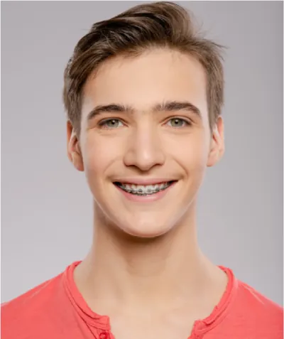 Teen boy smiling with braces